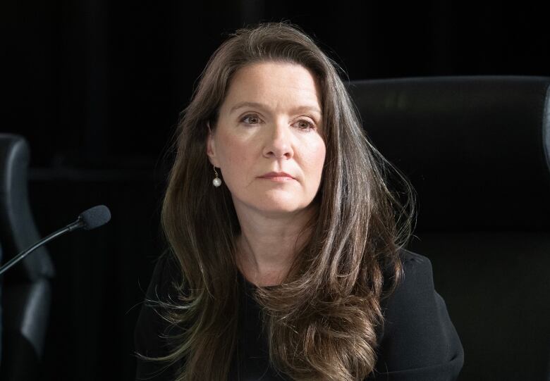 Katie Telford waits for hearings to begin at the Public Inquiry Into Foreign Interference in Federal Electoral Processes and Democratic Institutions, Tuesday April 9, 2024 in Ottawa.