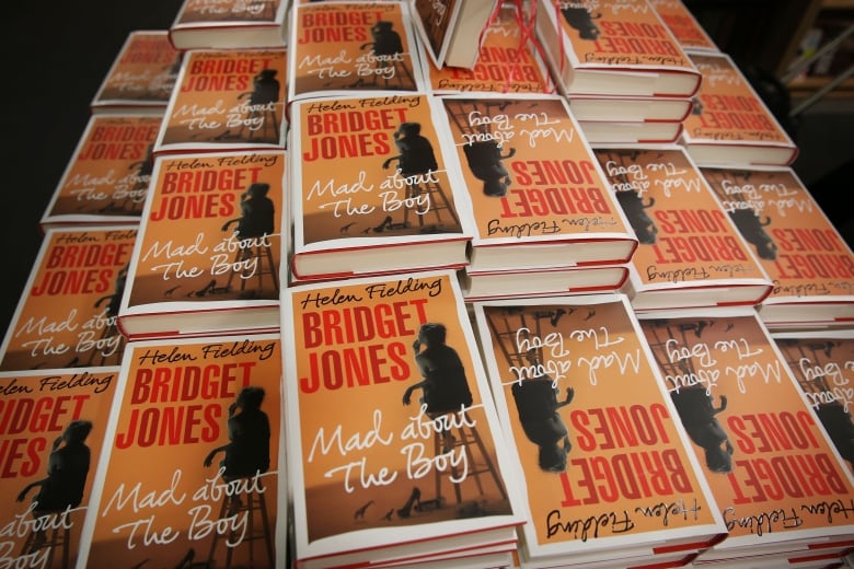 A stack  of books that say Bridget Jones: Mad About the Boy