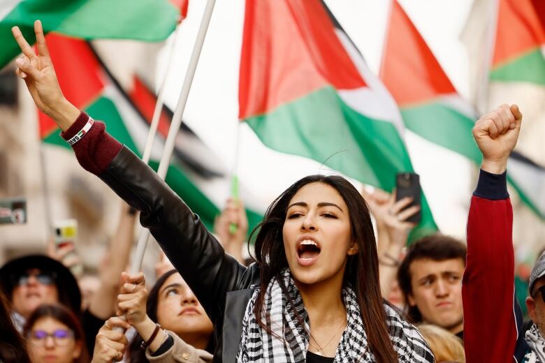 Students take part in a protest rally in Rome, Italy, Saturday, March 30, 2024, to support a caesefire in Gaza Strip