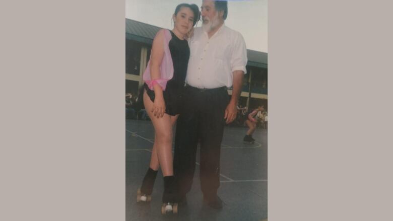 12-year-old Barbara and her father, Pedro Gomez, after an artistic skating presentation at school in Santiago, Chile.