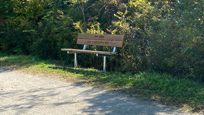 Tom Simon's bench enscribed with the quote 