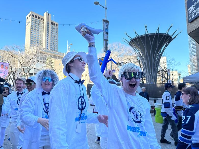 People clad in white for whiteout party