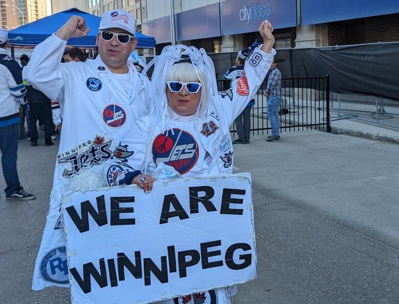 Two people wearing white.