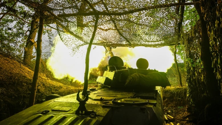 A Ukrainian howitzer fires in the direction of Russian forces near Kupiansk, Ukraine.