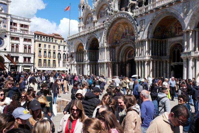 People in St. Mark's Square in Venice.