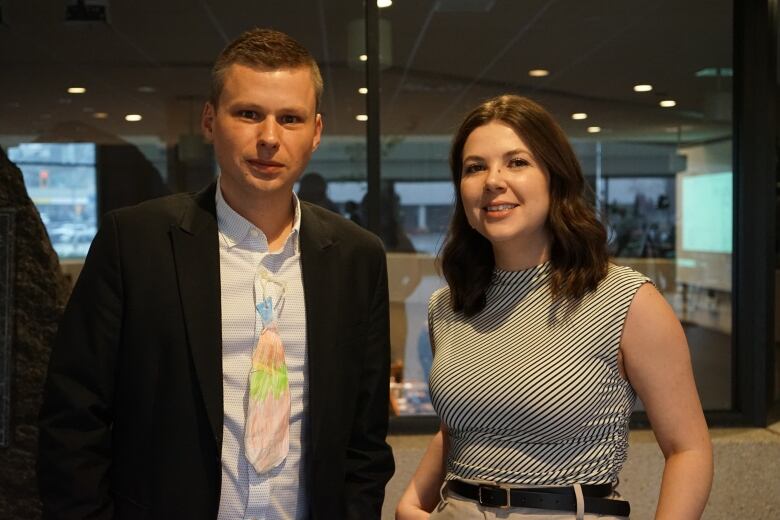 Portrait of a man and a woman. The man is wearing tie that was obviously drawn by a young child.