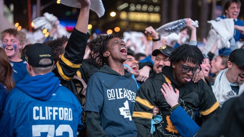 Leafs fans react to the first goal at game six of the NHL playoffs at the Maple Leafs Square Tailgate on May 2, 2024. 