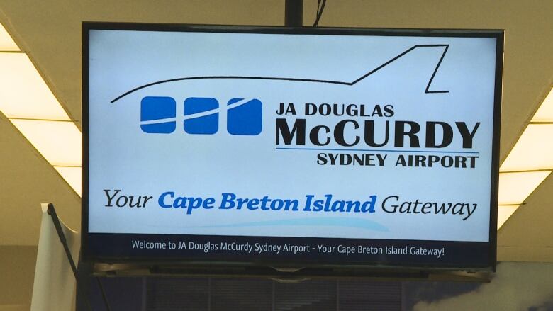 A video sign displaying the logo of JA Douglas McCurdy Sydney Airport.