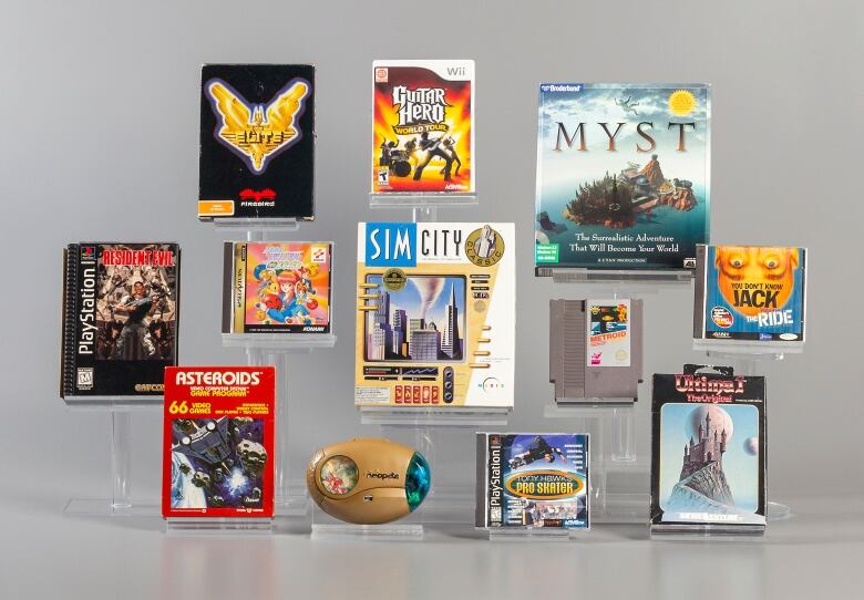 Display of 12 video game cartridges and retail boxes.