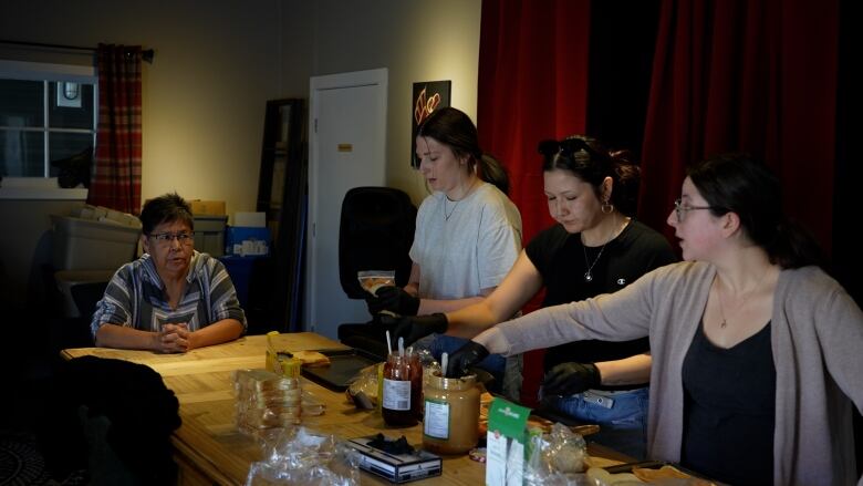 Alice Sam oversees the making of sandwiches at the Kuu-us Crisis Society in Port Alberni. 