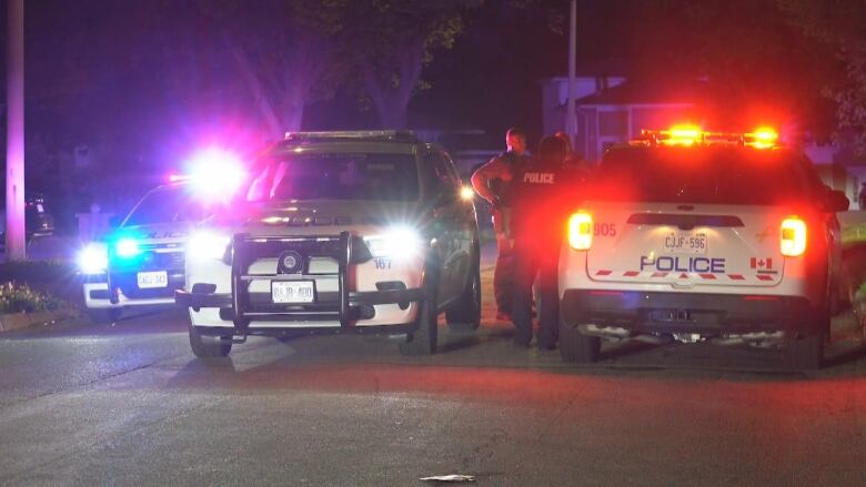 Peel police cars seen at scene of triple stabbing in Mississauga.