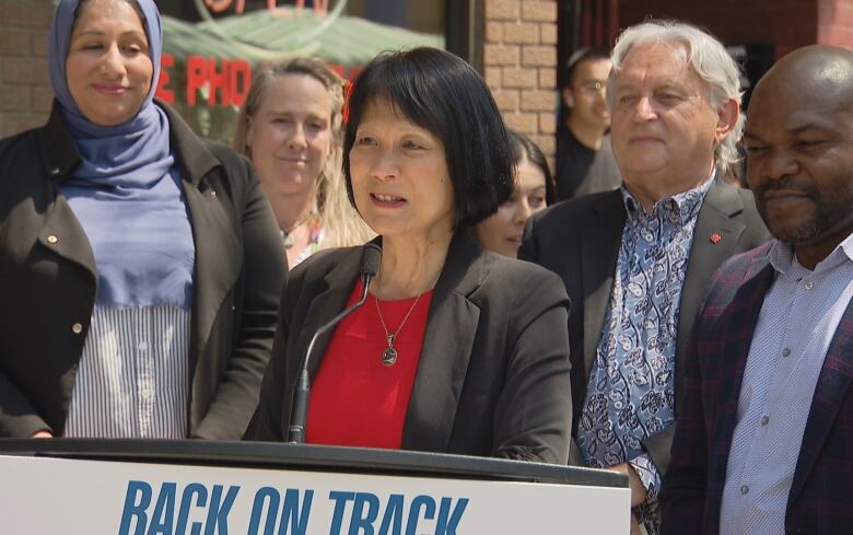 Toronto Mayor Olivia Chow speaks to reporters on Thursday to kick off the city's CafTO curb lane caf season this year.