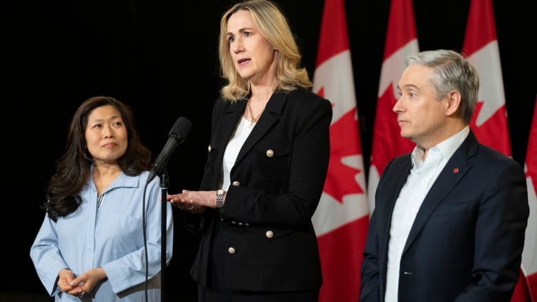 Canadian Ambassador to the United States Kirsten Hillman, centre, flanked by Minister of Export Promotion, International Trade and Economic Development Mary Ng (L) and Minister of Innovation, Science and Industry Francois-Philippe Champagne, speak to the media at the federal cabinet retreat in Montreal, Tuesday, Jan. 23, 2024.