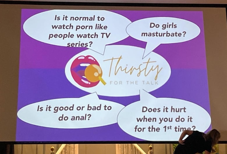 A pink and purple presentation slide with four text bubbles. 