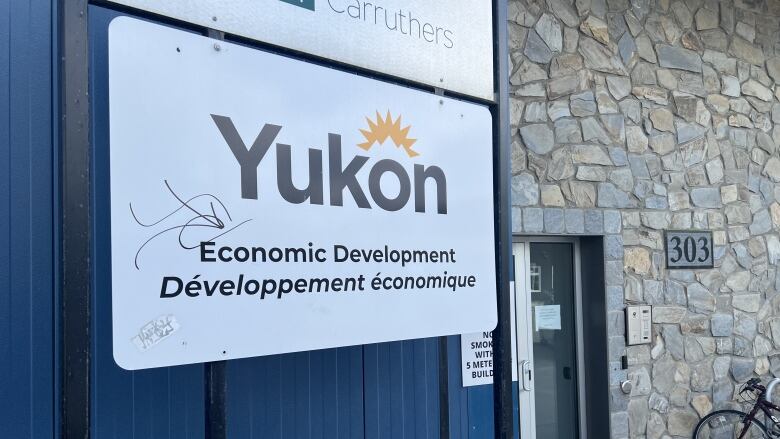 A sign outside of a building reads, 'Yukon Economic Development.'