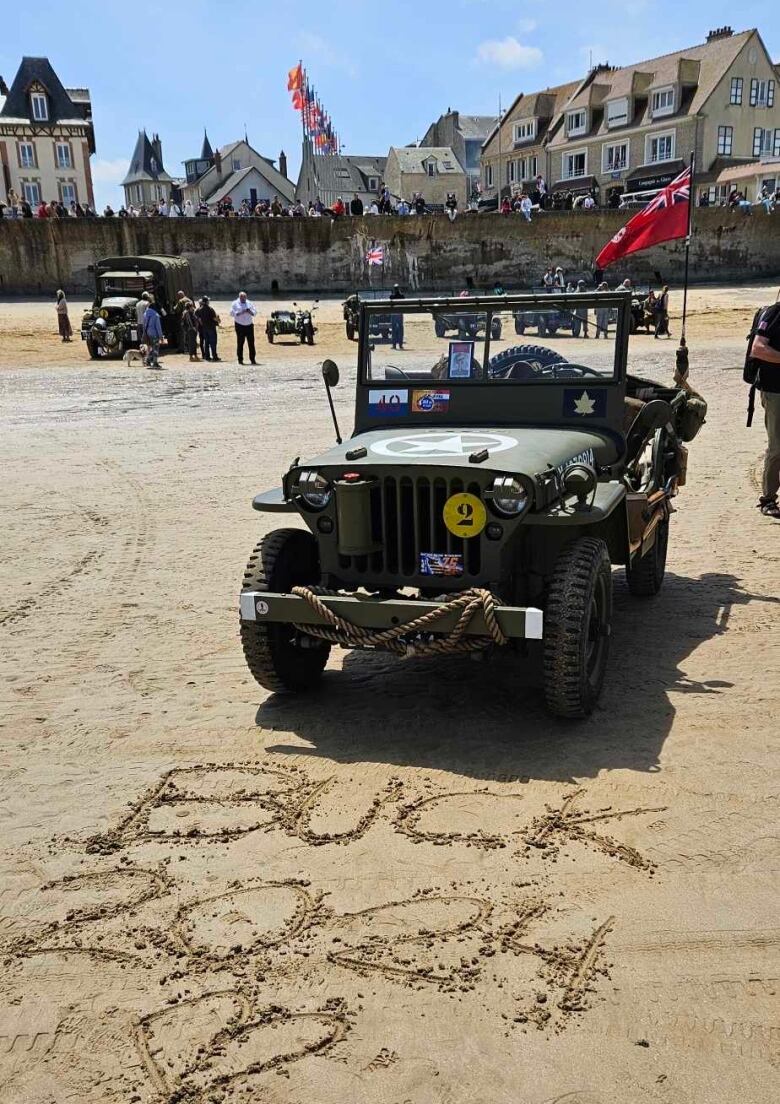 Jeep on a beach with 