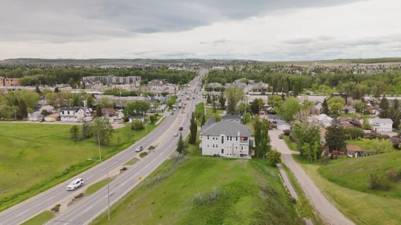 An aerial shot of a town is pictured.