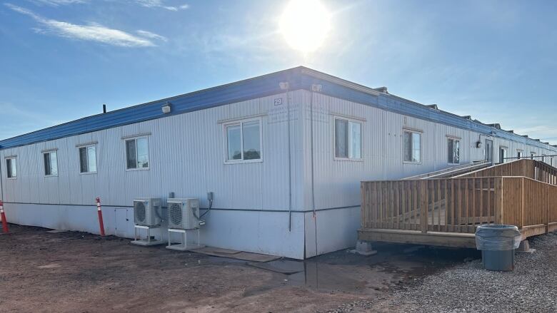 The outside of the Charlottetown Outreach Centre showing the entrance on a sunny day.