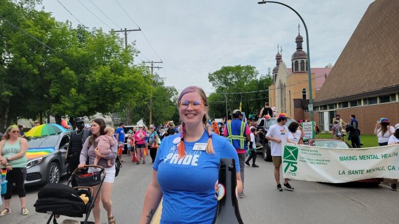 Person with a blue t-shirt. 