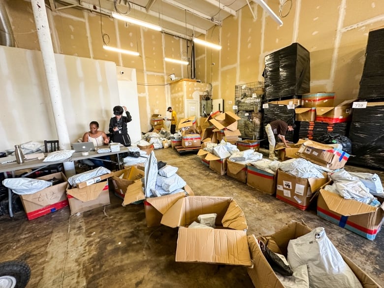 Boxes of packages inside a delivery warehouse.