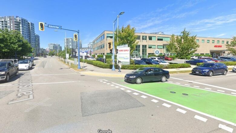 A Google Street view showing traffic on a sunny day at the corner of Alderbridge Way and Lansdowne in Richmond, B.C.