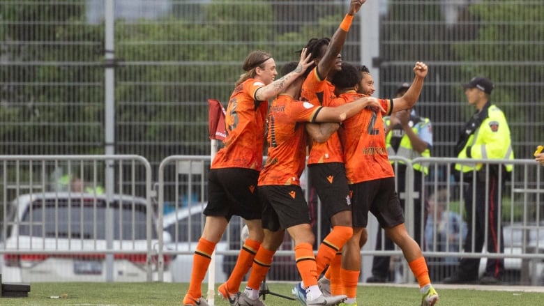 Forge FC teammates celebrate a goal against Toronto FC during first half Canadian Championship semifinal action in Hamilton, Ont., on Wednesday, July 10, 2024. 