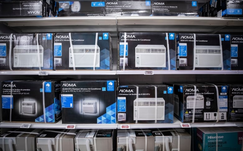 Rows of black boxes on a white shelf with air conditioner image printed on the front