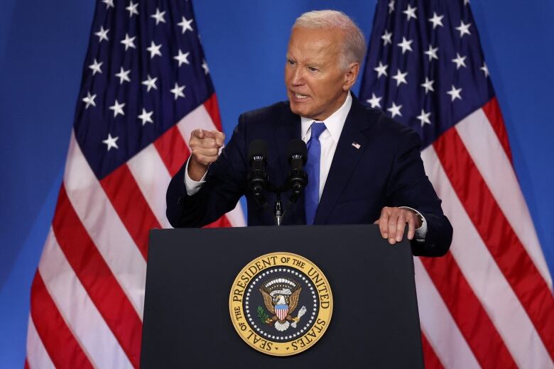 U.S. President Joe Biden is seen speaking at a press conference in Washington on Thursday.