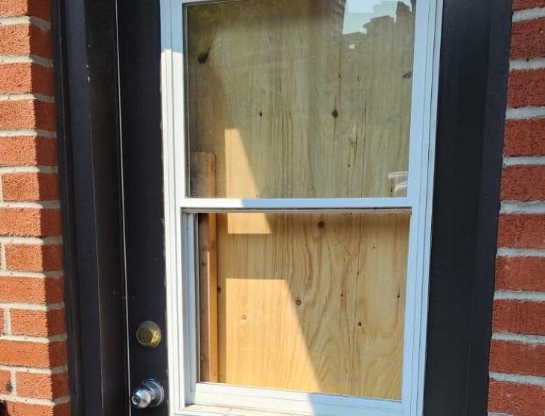 a boarded up window 