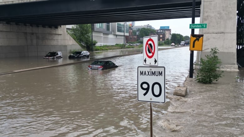 A drone image of the flooded DVP. Multiple cars are underwater. 