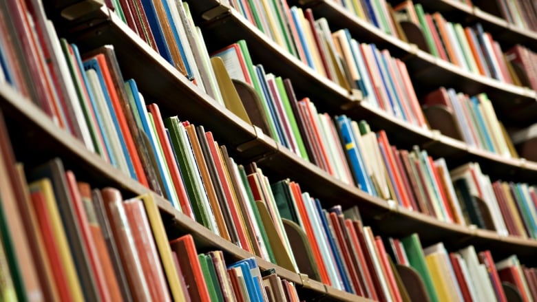 A closeup of a shelf full of books