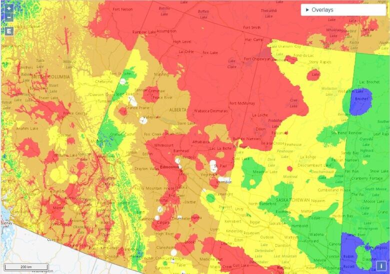 A map of Canada with yellow, green and red colours. 