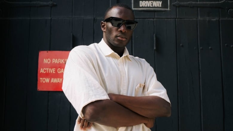 Canadian track and field athlete Jerome Blake poses for a photo.