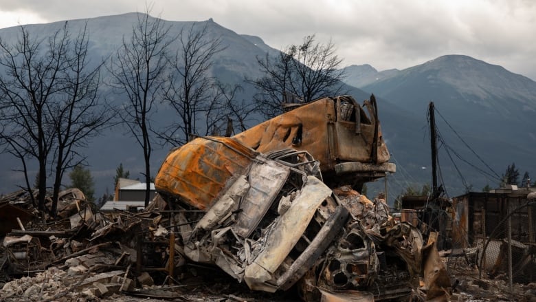 Wreckage of burned out vehicles.