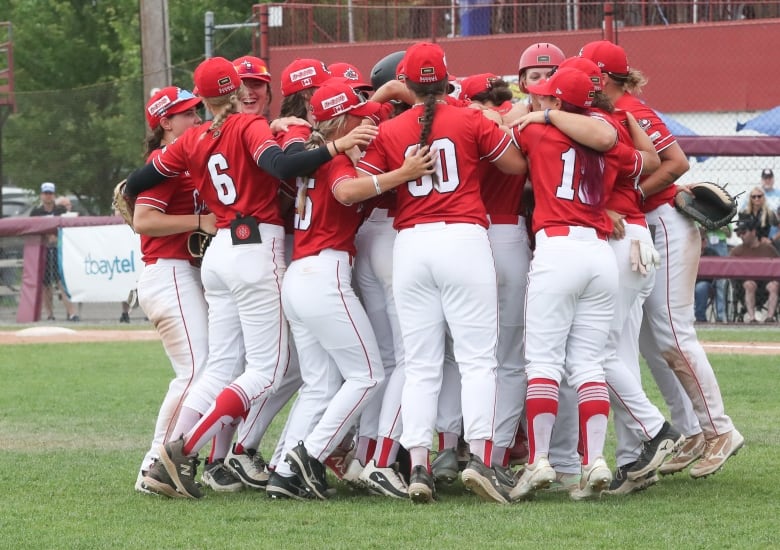 A baseball team celebrates