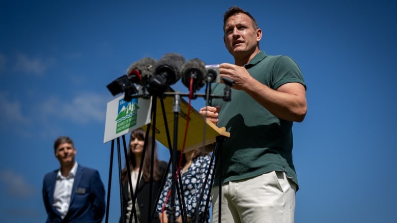 A man speaks at a podium marked Vancouver Board of Parks and Recreation.