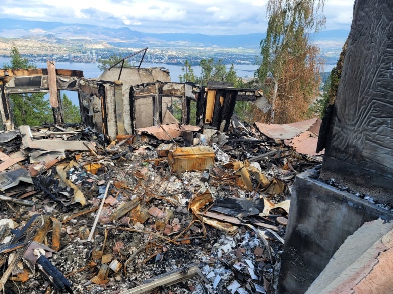 Burnt rubble of a home. 