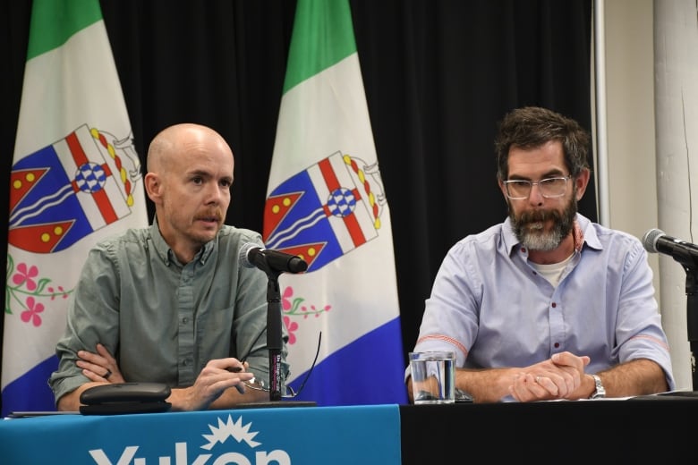 Yukon government fisheries biologist Cameron Sinclair and groundwater scientist Brendan Mulligan speak at a Aug. 9 briefing on Eagle mine. 