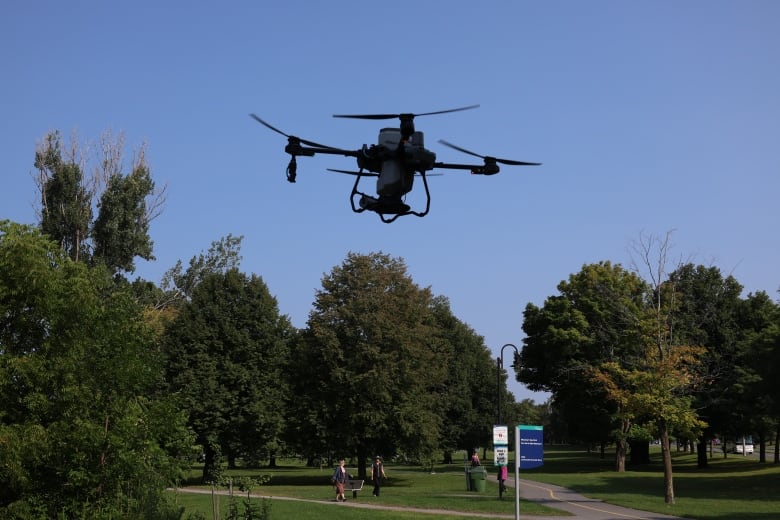 flying drone in park