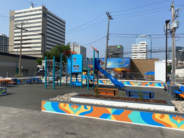 A outdoor playground sits on a newly made area for play, that will be available for the regina food ank clients to take their childen.