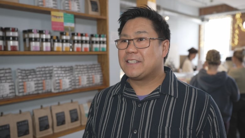 Matthew Lee, owner of Louie Coffee on King Street West near Dufferin Street, 