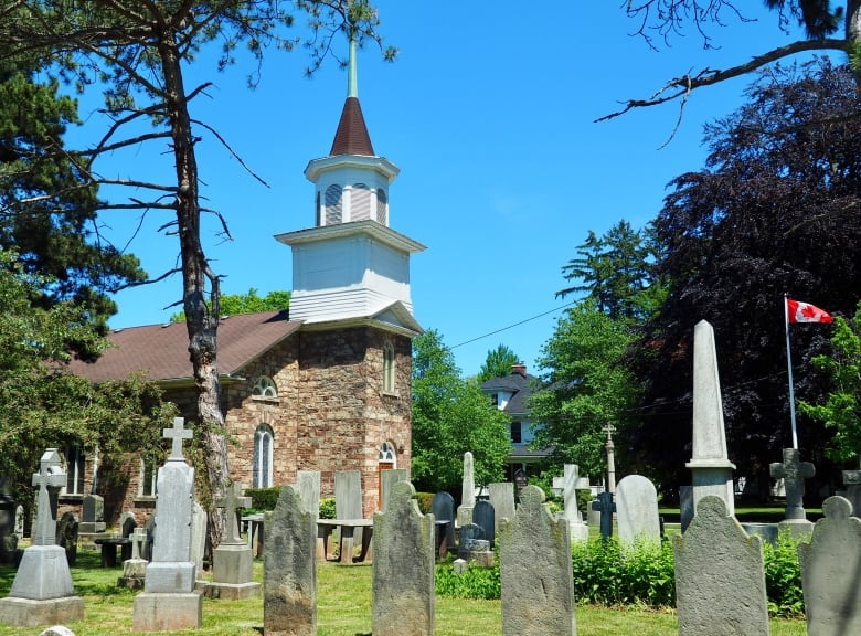 A Georgian-style church and cemetery.