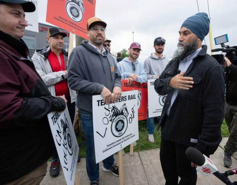 NDP Leader Jagmeet Singh joins locked out rail workers as they picket on the first day of a nationwide rail strike Thursday, August 22, 2024 in Montreal.