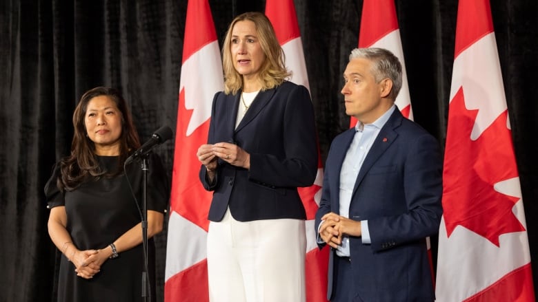 International Trade Minister Mary Ng, left to right, Canada's Ambassador to the United States Kirsten Hillman and Industry Minister Francois-Philippe Champagne speak to media at the federal cabinet retreat in Halifax, Tuesday, Aug. 27, 2024.