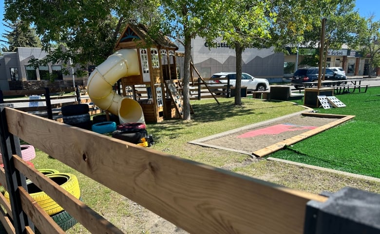 A small playground and sandbox are part of the park installation in the parking lot by the Christian Life Assembly church off Richmond Road.