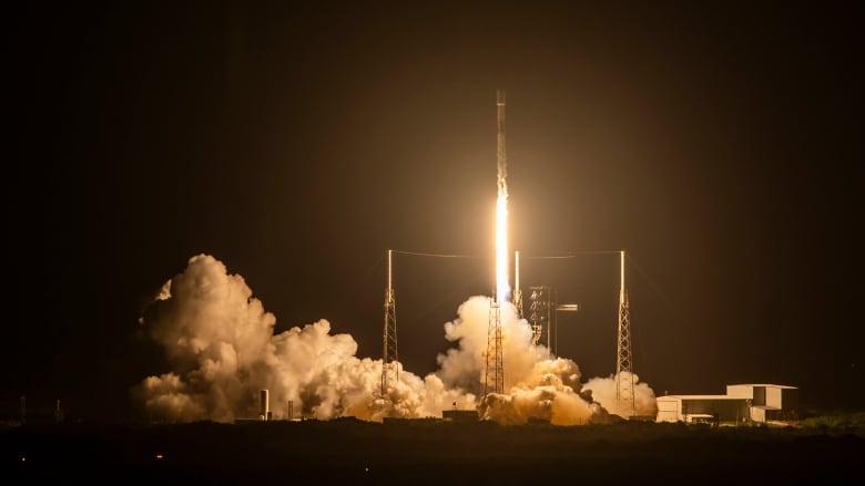 A SpaceX Falcon 9 rocket is seen launching from Cape Canaveral, Fla., on Wednesday.