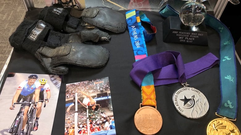 Photos, medals and a trophy recall the history of Saskatchewan para-athletes.