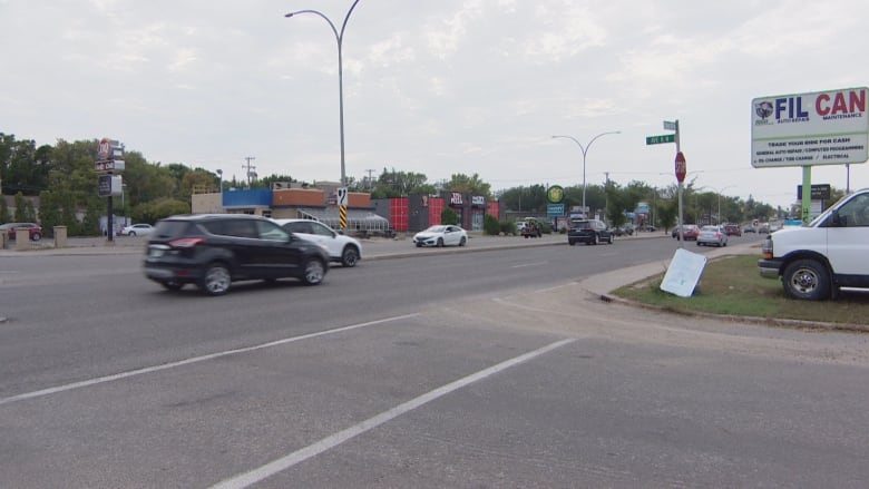 The street of a fatal cyclist collision at 22nd Street West and Avenue K North. Dairy Queen and other establishments can be seen across the street. 