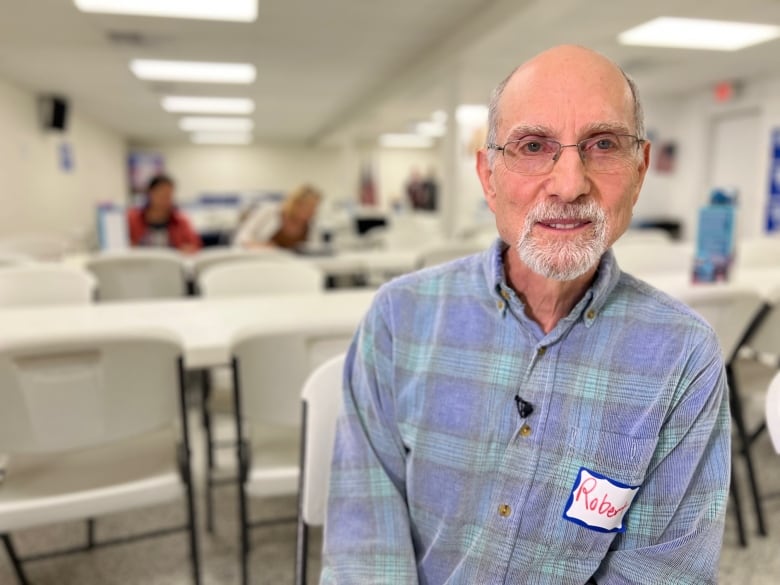 Senior citizen male at desk