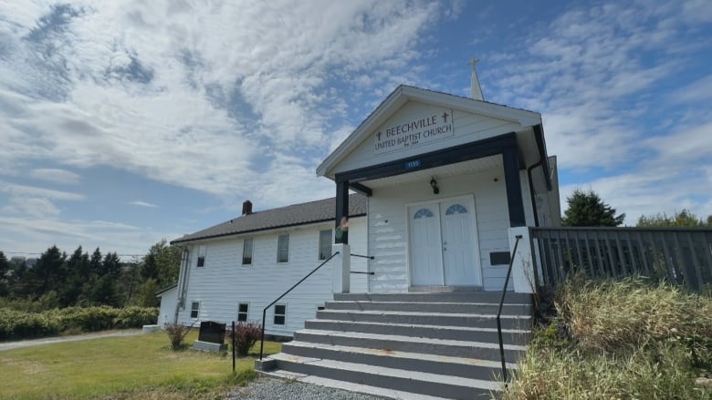 A picture of the exterior of the church from in front of the entrance. 